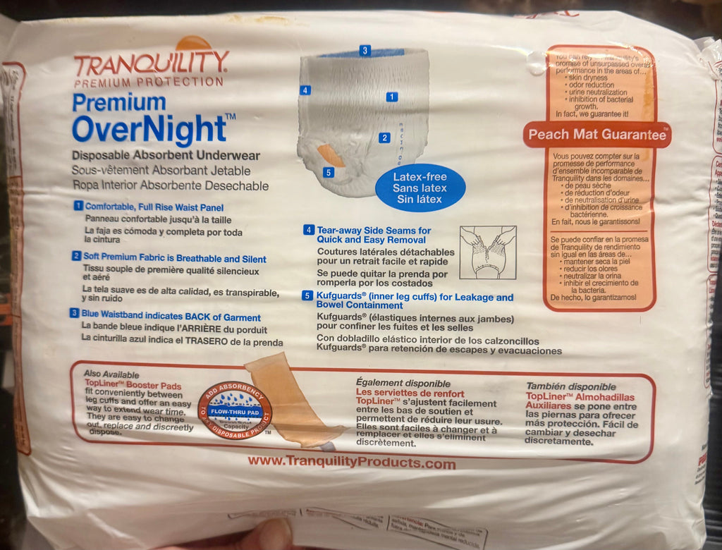Tranquility Premium OverNight Disposable Underwear Small — back of package with features and Peach Mat Guarantee