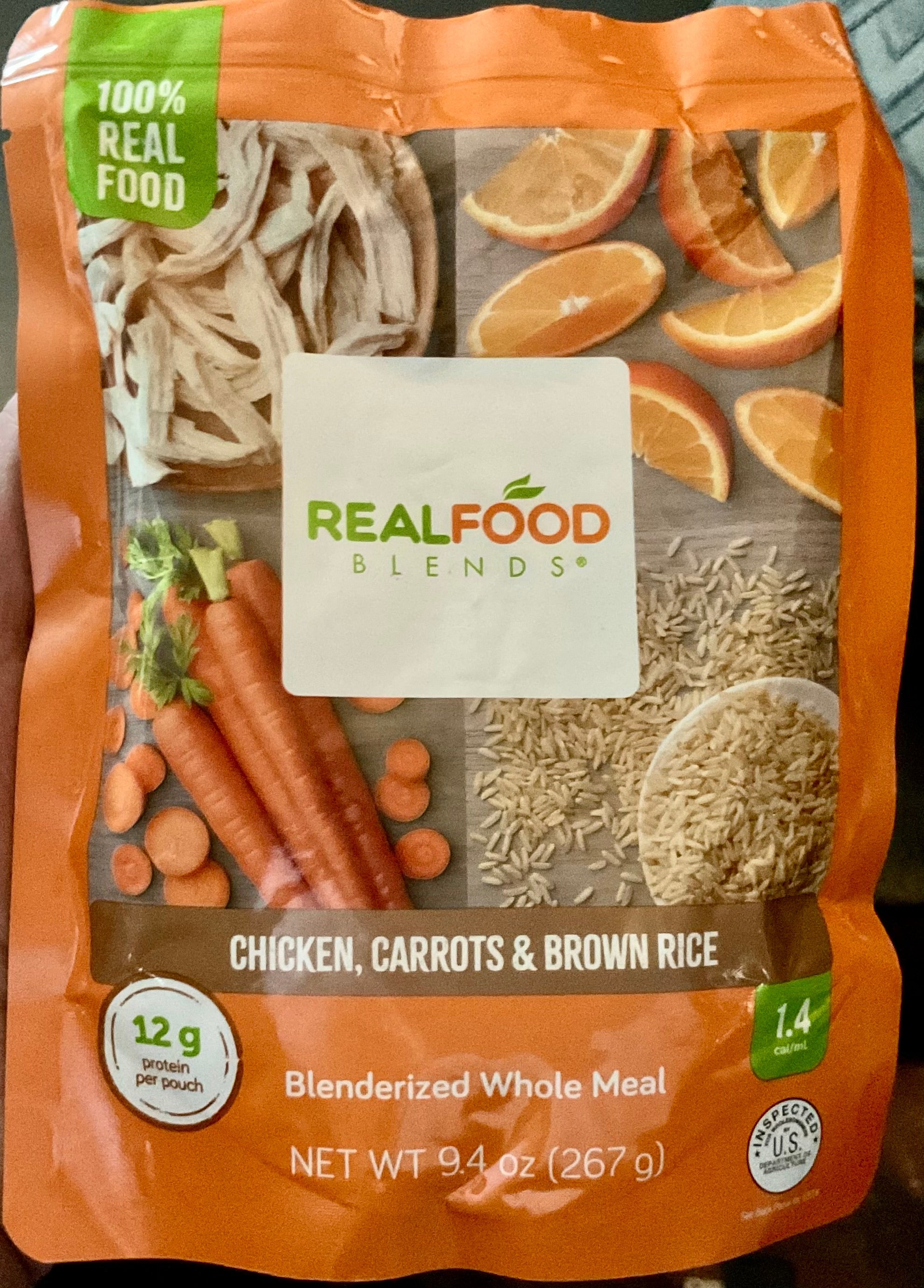 Real Food Blends Chicken, Carrots & Brown Rice blenderized tube feeding formula — front of pouch, 100% real food, 12g protein, 1.4 cal/mL