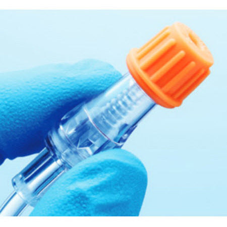 Gloved hand applying ICU Medical SwabCap orange disinfecting cap to needlefree IV connector