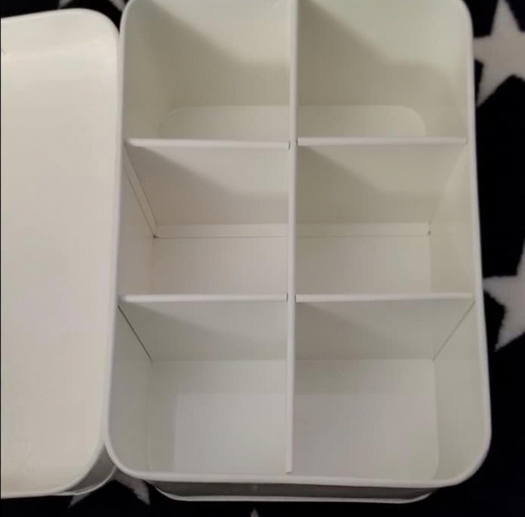 Florence Nightingale Pharmacy First Aid Kit tin — interior view showing 6 white divided compartments (2 columns x 3 rows)