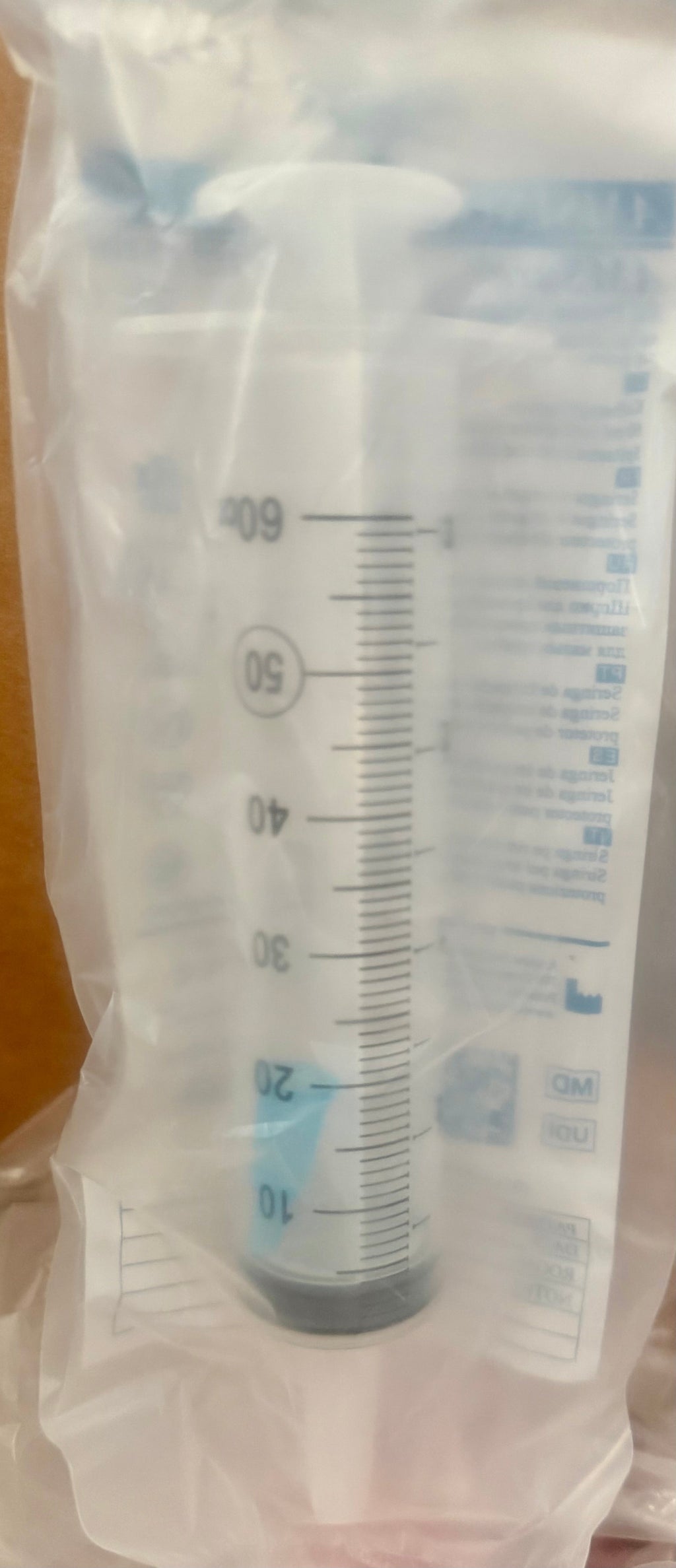 Amsino AMSure 60mL Piston Irrigation Syringe — sterile packaged unit