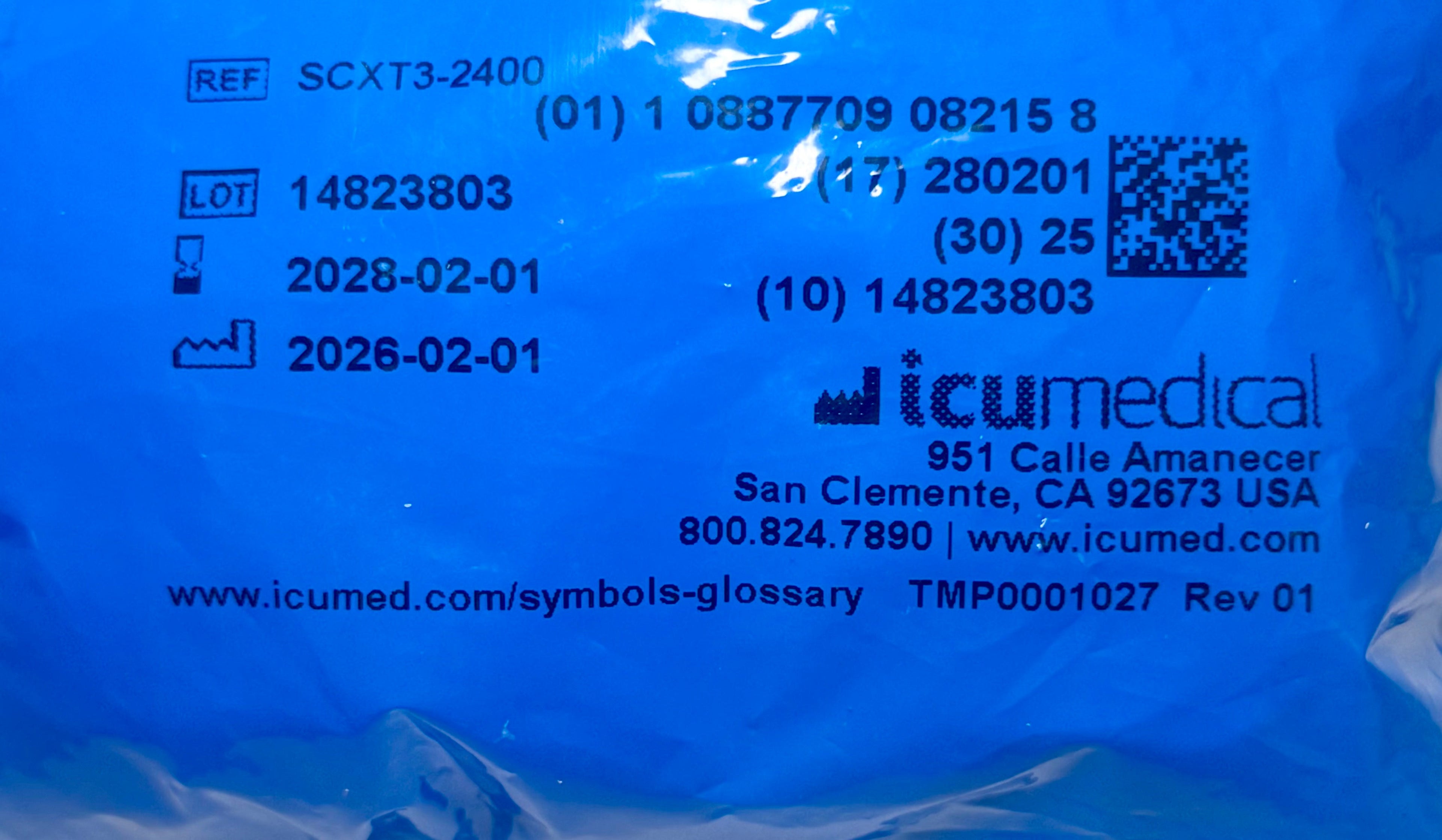 ICU Medical SwabPack packaging label showing REF SCXT3-2400, lot and expiry details